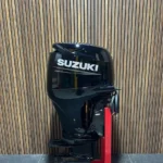 Suzuki 100 HP EFI outboard engine.