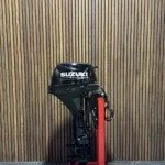 Suzuki 15 HP EFI Powertilt outboard engine.