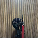 Tohatsu 9.9 HP EFI Powertilt outboard engine.